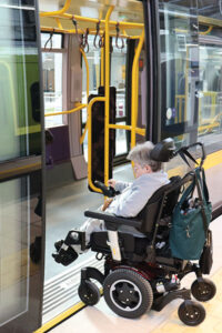 person in wheelchair - boarding Luas 400x600 pixels