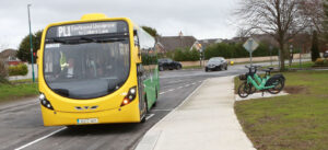 portlaoise town bus PL1 with bike and car in background