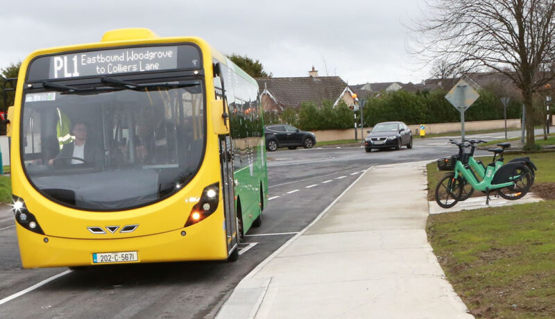 portlaoise town bus PL1 with bike and car in background